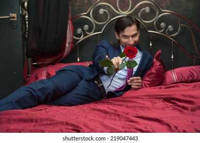Man Suit Lying On Bed Red 스톡 사진 Shutterstock