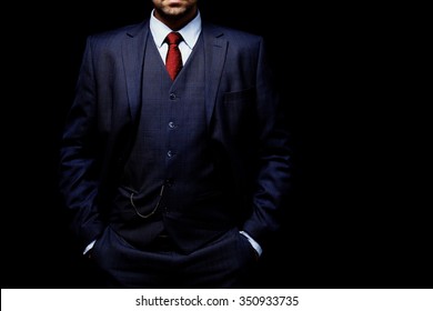 Man In Suit On A Black Background