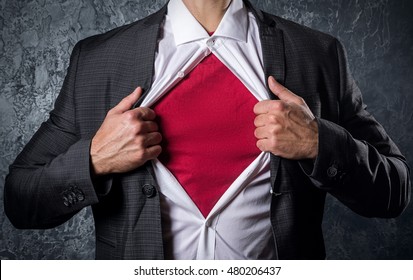 Man In Suit Opening His Shirt