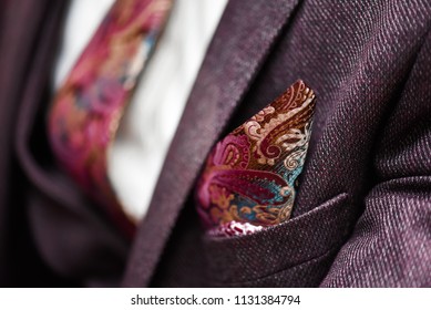 Man In Suit, Plaid Texture, Bow Tie And Pocket Square, Close Up White Background