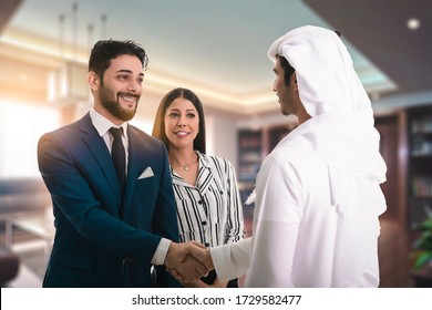 Man In Suit Shake Hand Of Arabic Business Man As Hello In Office. Offer Job Position, Great Thanks Gesture Summit Participate Approval Motivation Strike Arm Bargain Concept.