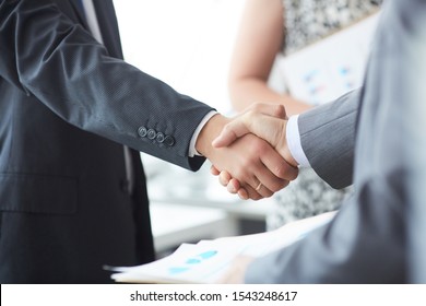 Man In Suit Shake Hand As Hello In Office Closeup. Friend Welcome Mediation Offer Positive Introduction Greet Or Thanks Gesture Summit Participate Approval Motivation Strike Arm Bargain Concept.