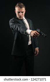 Man Suit Shooting Gun Studio Shot Stock Photo 124271071 | Shutterstock