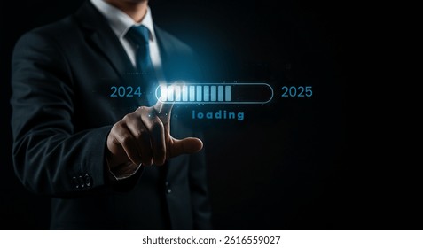 Man in suit touching loading bar from 2024 to 2025 on digital display against a dark background technology, business, innovation, digital, data, analytics, ui, futuristic, dashboard, interface, financ