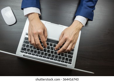 Man In Suit Working In Office Desk, Typing On Keyboard, Top View