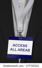 Man In Suite Wearing An Access All Areas Pass Arround His Neck