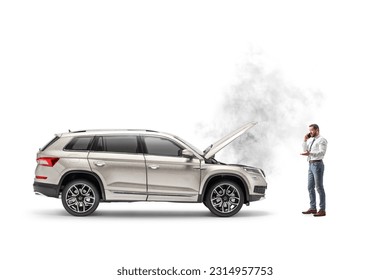 Man with a SUV calling road assistance company isolated on white background - Shutterstock ID 2314957753