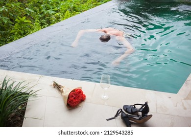 Man Swimming After Wild Party To Get Rid Of Hangover.