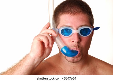 Man With Swimming Goggles And Snorkle Over White Background