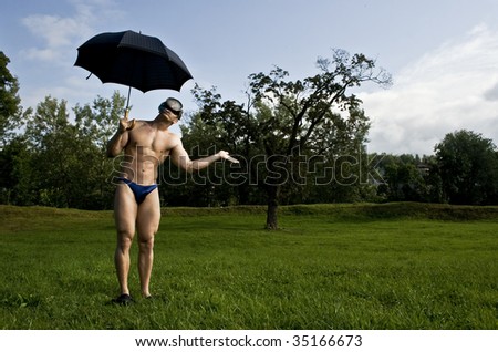 Similar – sports guy in his underwear looking at the river