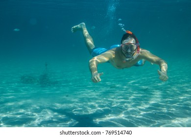 Man Swimming Underwater