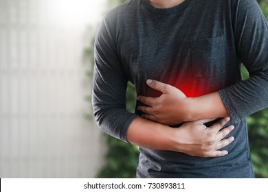 MAN With Symptomatic Acid Reflux , Suffering From Acid Reflux