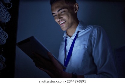 Man, tablet engineering and server room or data center management, system solution or cybersecurity at night. Happy, electrician person on digital tech with power, electricity or programming in dark