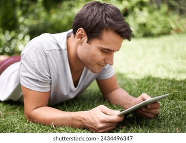 Man, tablet and garden reading or relax connection fr browsing social media on weekend, subscription or online. Male person, backyard and nature rest with ebook for entertainment, search or internet - Powered by Shutterstock