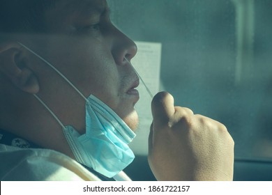 A Man Takes A COVID-19 Test During A Free COVID-19 Testing In Los Angeles, Wednesday, Nov. 25, 2020.  (Ringo Chiu Via AP)