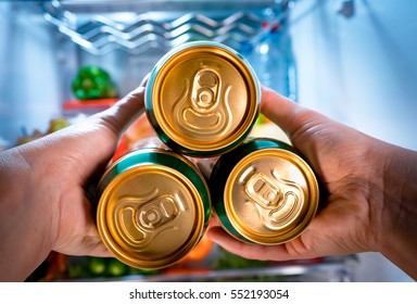 Man Taking Beer From A Fridge