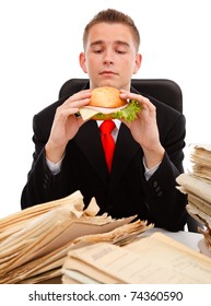 Man Taking A Break During Paperwork, Eating A Sandwich