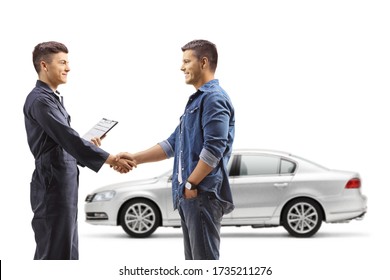 Man taking car to an auto repair shop and shaking hands with auto mechanic worker isolated on white background - Powered by Shutterstock