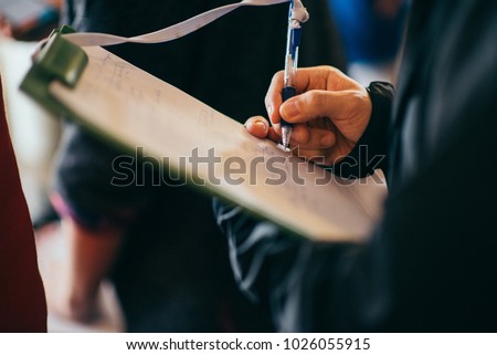 Man Taking Notes on Clipboard, Clipboard Notes, 