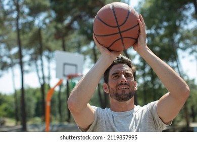 Man Taking A Penalty Shot With Basketball