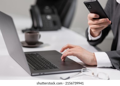 Man Taking Pictures On Laptop Screen Phone. Screenshot