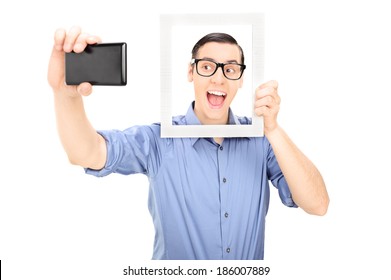 Man Taking A Selfie And Holding A Picture Frame Isolated On White Background