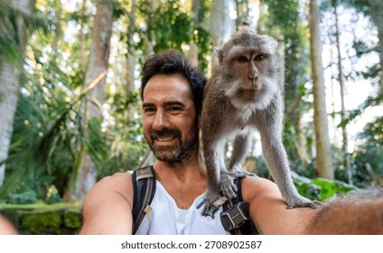 Man taking a selfie with a monkey