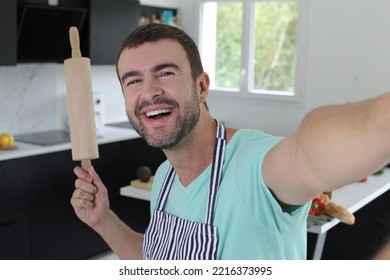 Man Taking Selfie With Rolling Pin In The Kitchen 