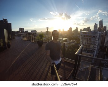 Man taking a selfie with Sydney Skyline on background, Australia - Shutterstock ID 553647694