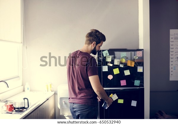 Man Taking Water Bottle Fridge Pantry Stock Photo Edit Now 650532940