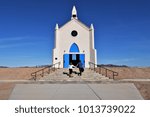 Man taking woman up the stairs to chapel