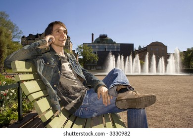 Man talking to a cellphone in a park