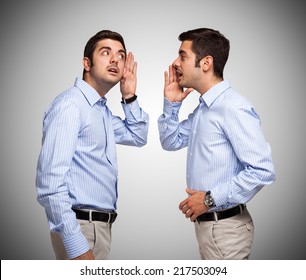 Man Talking To A Clone Of Himself
