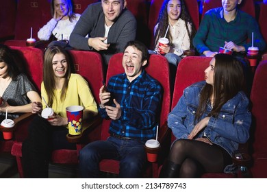 A Man Is Talking Loudly On The Phone In A Movie Theater And Prevents You From Watching A Movie. The Man Makes A Remark And Asks To Turn Off The Phone.