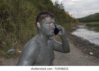 Man Talking Phone Mud Bath Resort Selective Focus 