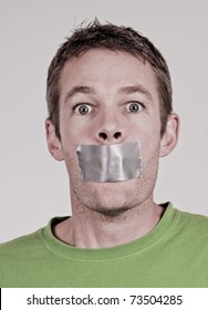 Man With Tape Over His Mouth