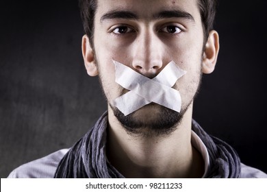 Man With Tape Over His Mouth.