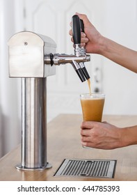 A Man Is Tapping Nitrogen Gas Cold Brew Coffee Machine.