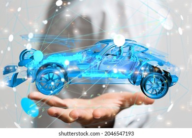 A man tapping on a 3D rendering of an autonomous electric car