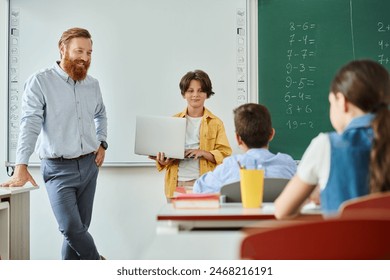 A man teacher standing confidently in front of a diverse group of kids, actively instructing them in a bright, lively classroom setting. - Powered by Shutterstock