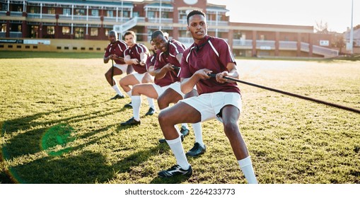 Man, team and sports tug of war with rope for fitness exercise, strength challenge or competition on field. Sport men in rivalry, teamwork struggle or leadership pulling ropes in training activity - Shutterstock ID 2264233773