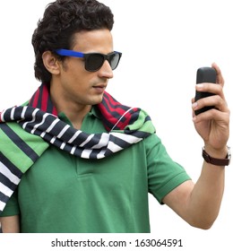 Man text messaging on a mobile phone