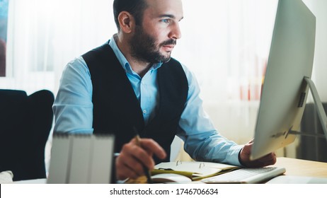 Man Thinking Looking In Monitor Computer At Home Workplace. Social Distance Bearded Businessman Working At Office, Finance Consultant Online Communication Work Process, Student Online Education