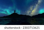man thinking and looking up under the starry sky