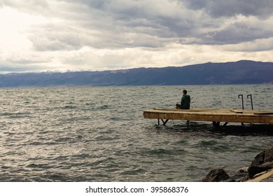 Man thinking on Dock