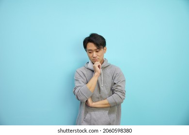 A man in a thinking pose