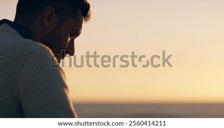 Man, thinking and reflection at beach, sunset and promenade for memory with mock up space in evening. Person, pier and grief by sea, ocean and outdoor with sky, horizon and loss in New Zealand