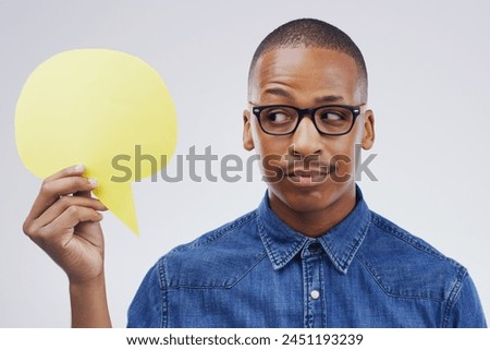 Man, thinking and studio with speech bubble or comment, idea and promotion for advertising. Opinion, faq and quote for product placement, reply or answer for conversation on white background