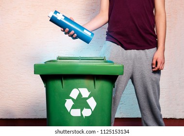 Man Throwing Nickel Cadmium/alkaline Battery In Recycle Bin, Toxic Waste, Batteries, Chemicals Disposal Concept