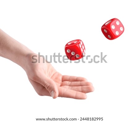 Man throwing red dice on white background, closeup